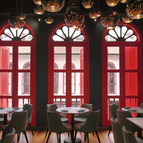 Tanoke: lush teal walls and glossy red windows.