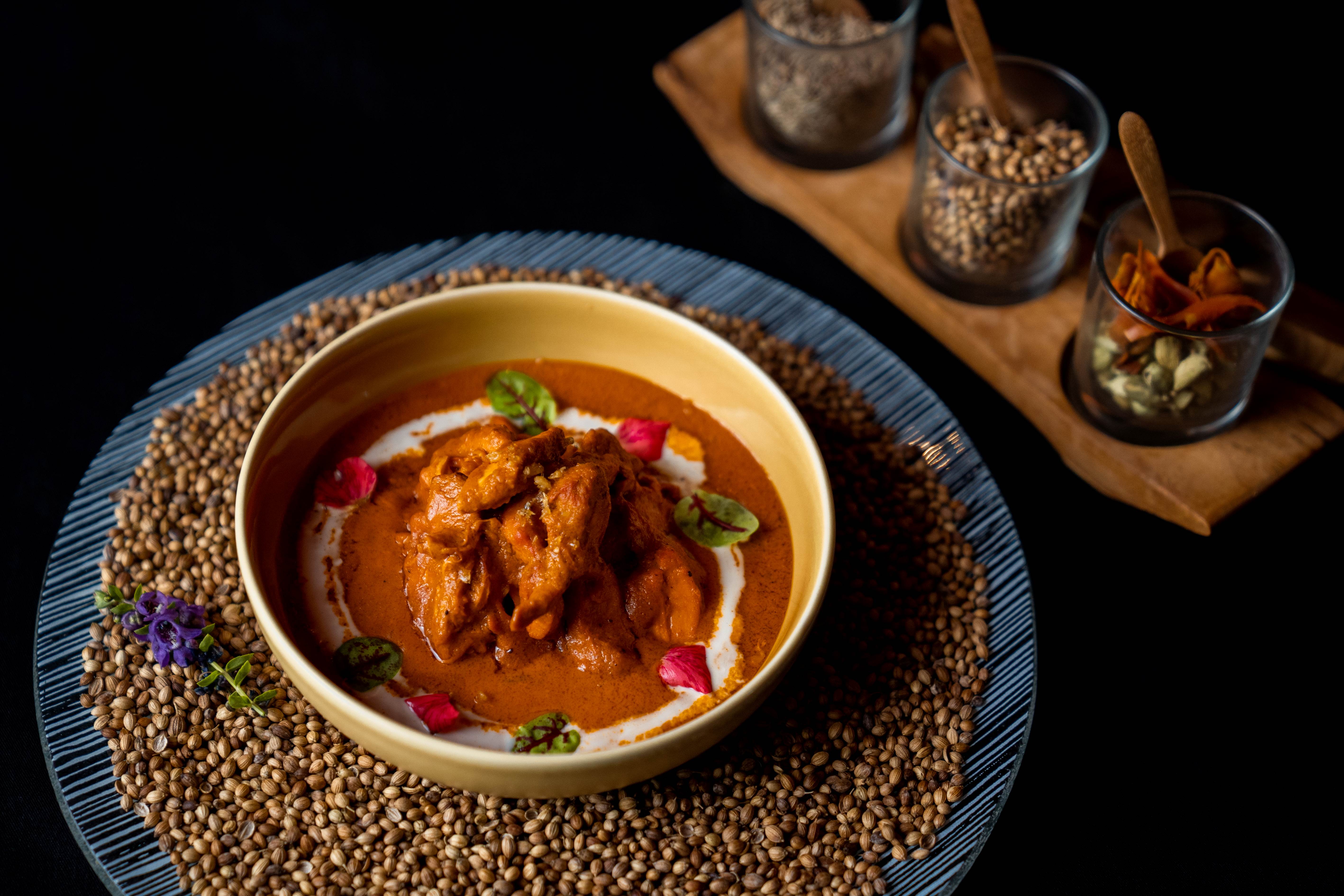 Mugh Makhani or traditional butter chicken served by Queen's Tandoor Bali.