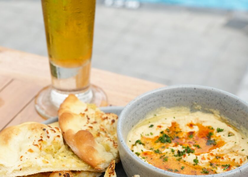 The Stones Hotel - Legian Bali's pool bar hummus package