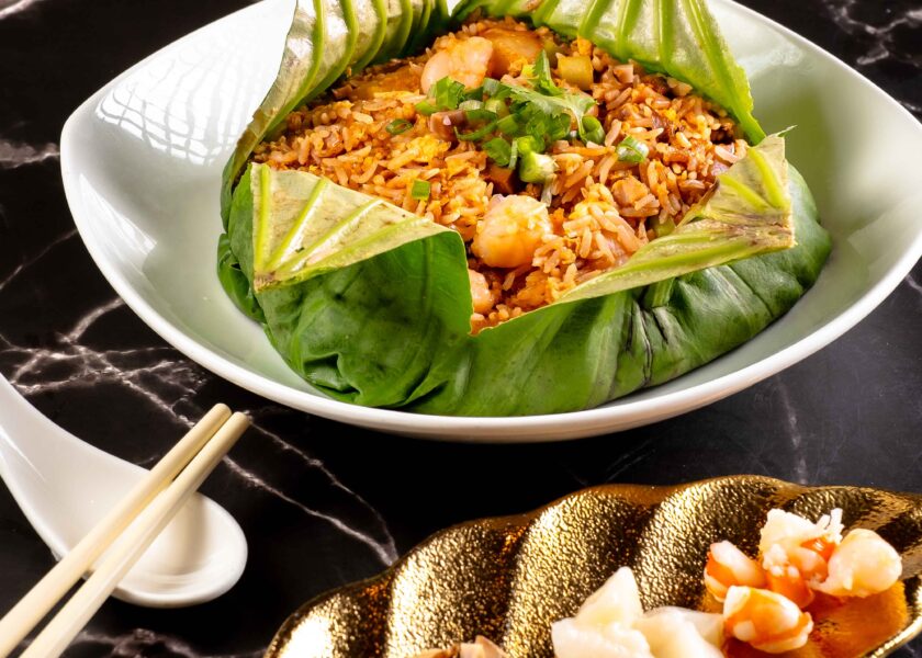 Asia Grand Singapore's dish covered in a lotus leaf.